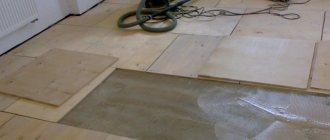 plywood under linoleum on a wooden floor