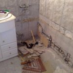 How to dismantle and remove an old cast iron bathtub from the bathroom