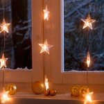 Star-shaped light bulbs in garland decorations at home