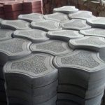 production of vibro-cast paving slabs